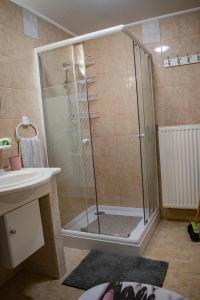 Kúpeľňa v ubytovaní Katyca Apartman