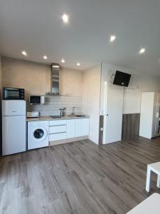 Kuchyňa alebo kuchynka v ubytovaní APARTAMENTO AMARÉ