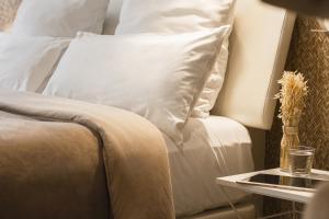 A bed or beds in a room at room Select Tetuán