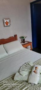 Cama ou camas em um quarto em Fazenda Hotel Engenho