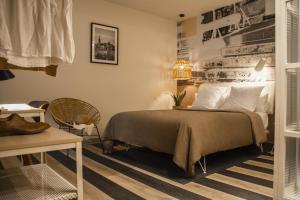 A bed or beds in a room at room Select Tetuán