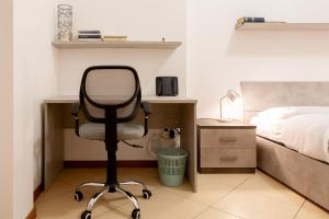A bed or beds in a room at BnButler - Pellegrino Rossi, 42 - Ampio e Comodo per 5