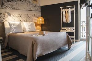 A bed or beds in a room at room Select Tetuán