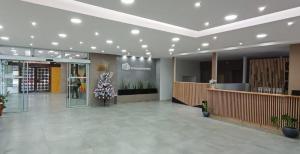 a lobby of a store with a christmas tree on the wall at CONDOR STUDIO BARILOCHE in San Carlos de Bariloche