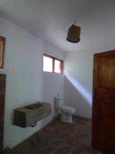 Ein Badezimmer in der Unterkunft Nshongi Camp