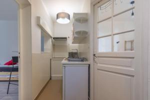 Kuchnia lub aneks kuchenny w obiekcie Cénoslocs Bondy - Paris à vos pieds pour 4 personnes avec Jardin & Wifi