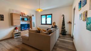 TV a/nebo společenská místnost v ubytování Appartamento panoramico