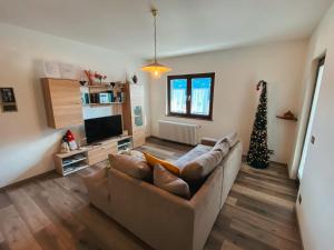 TV a/nebo společenská místnost v ubytování Appartamento panoramico