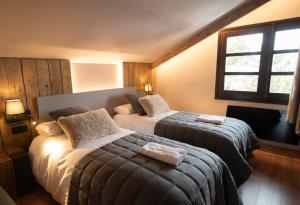 Giường trong phòng chung tại Borda Conangle Mountain Lodge