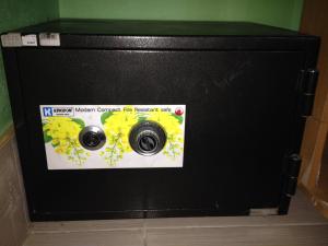 a black refrigerator with two cameras on it at Lanta Maikeaw Bungalow in Ko Lanta
