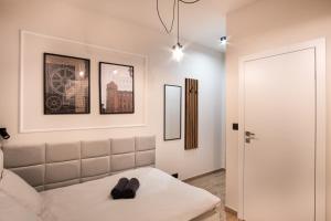 Łóżko lub łóżka w pokoju w obiekcie Dream Apartments - Gdańska 72