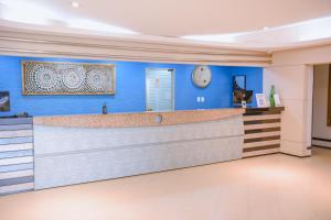 The lobby or reception area at Hotel Praia Ponta d'Areia