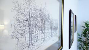 a drawing of a building on a wall at Apartment No15 in Koprivnica