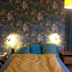 Ένα ή περισσότερα κρεβάτια σε δωμάτιο στο Le Fayard