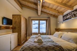 Posteľ alebo postele v izbe v ubytovaní Chalet Panache