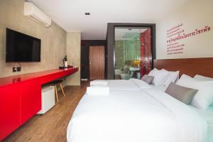 En eller flere senger på et rom på Stellars Samed Resort