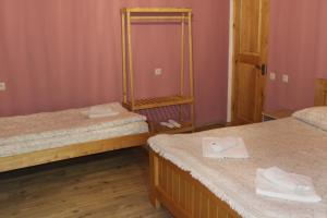 Letto o letti in una camera di guest house kesa