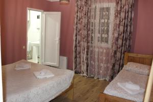 Letto o letti in una camera di guest house kesa