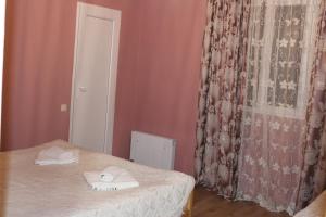 Letto o letti in una camera di guest house kesa