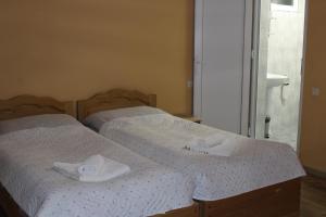 Letto o letti in una camera di guest house kesa