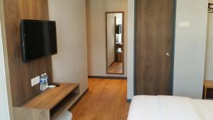 TV a/nebo společenská místnost v ubytování Go Hotel
