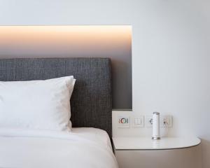 Postel nebo postele na pokoji v ubytování Mirada Hotel