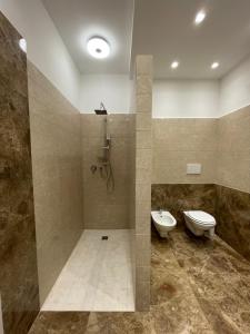 Koupelna v ubytování Suite 55 in centro