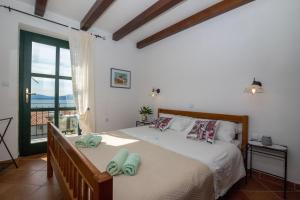 Postel nebo postele na pokoji v ubytování Apartment Zvonimir