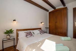 Postel nebo postele na pokoji v ubytování Apartment Zvonimir