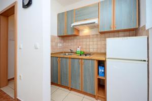 Kuchyňa alebo kuchynka v ubytovaní Apartments Blazenka
