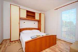 Posteľ alebo postele v izbe v ubytovaní Apartments Blazenka