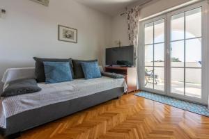 Postel nebo postele na pokoji v ubytování Apartments Vila Antula