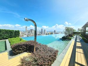 a swimming pool with a view of the city at Beacon Executive Suites - Penang in George Town