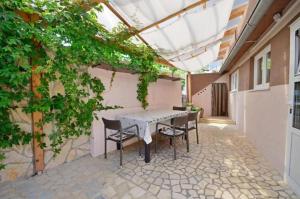 Patio nebo venkovní prostory v ubytování Apartments Ivan Marina
