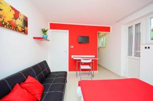 TV a/nebo společenská místnost v ubytování Apartments Ivan Marina