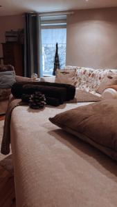 Ένα ή περισσότερα κρεβάτια σε δωμάτιο στο Le moulin de l Epine