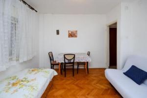 Posteľ alebo postele v izbe v ubytovaní Apartments Lucia