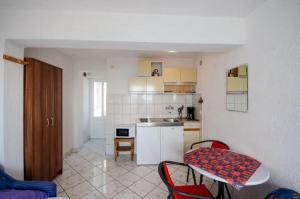 Kuchyňa alebo kuchynka v ubytovaní Apartments Lucia
