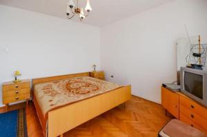 Posteľ alebo postele v izbe v ubytovaní Apartments Lucia