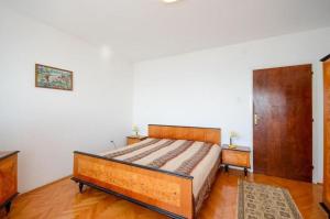Posteľ alebo postele v izbe v ubytovaní Apartments Lucia