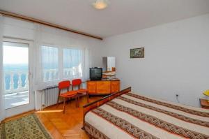Posteľ alebo postele v izbe v ubytovaní Apartments Lucia