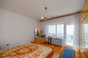 Posteľ alebo postele v izbe v ubytovaní Apartments Lucia
