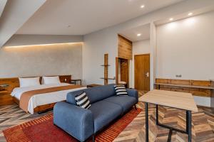 Postel nebo postele na pokoji v ubytování Ivy Hotel