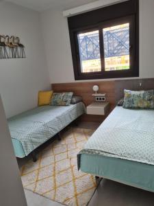 Posteľ alebo postele v izbe v ubytovaní Apartament Sunset Waves 67