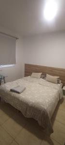 Postel nebo postele na pokoji v ubytování Habitación privada Tenefe