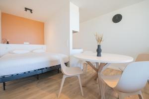 Letto o letti in una camera di Ostend Studio