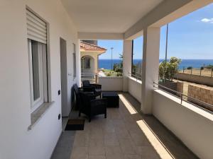 A balcony or terrace at ApartHotel Capo Rizzuto