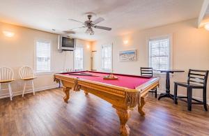 a living room with a pool table in it at Sunrise to Sunset in Whalebone