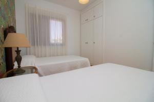 Posteľ alebo postele v izbe v ubytovaní Sea View Meloneras Terrace Duplex +Wifi +Barbecue