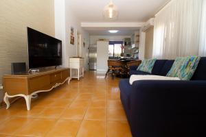 Televízia a/alebo spoločenská miestnosť v ubytovaní Sea View Meloneras Terrace Duplex +Wifi +Barbecue